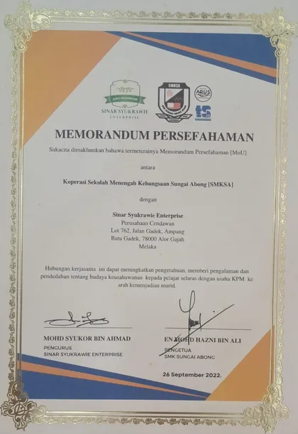 Sijil Memorandum Persefahaman antara Koperasi SMK Sungai Abong dan Sinar Syukrawie Enterprise.