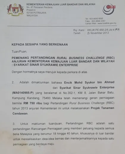 Surat Kementerian Kemajuan Luar Bandar dan Wilayah mengesahkan Sinar Syukrawie Enterprise pemenang Rural Business Challenge.